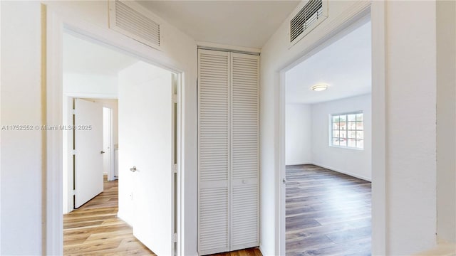 219 SW 6th Ln, Florida City, FL 33034 - hallway with light wood finished floors and visible vents