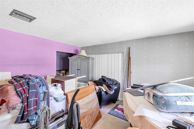 766 NW 24th Ave, Delray Beach, FL 33445 - bedroom with a textured ceiling and tile patterned flooring