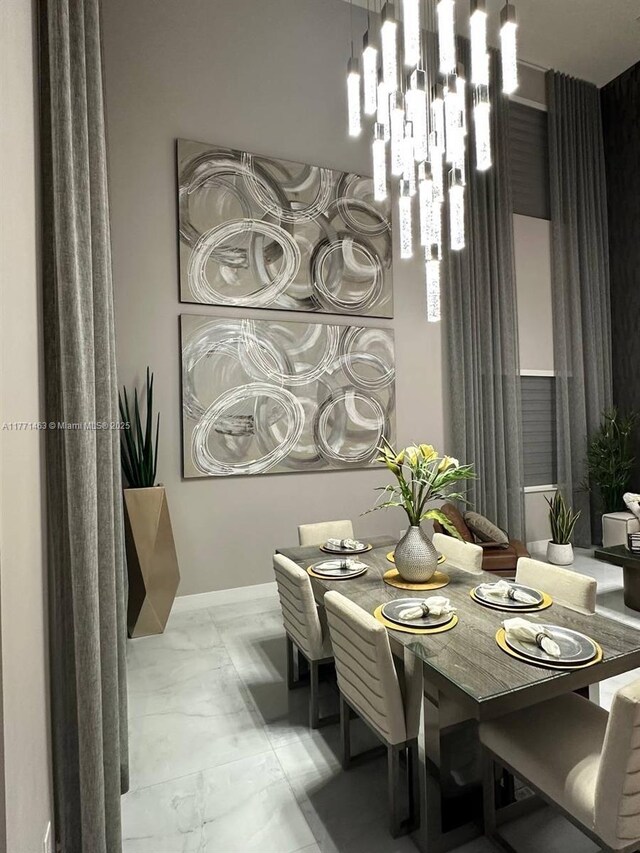 8868 NW 161st Ter, Miami Lakes, FL 33018 - dining room featuring light marble finish floors
