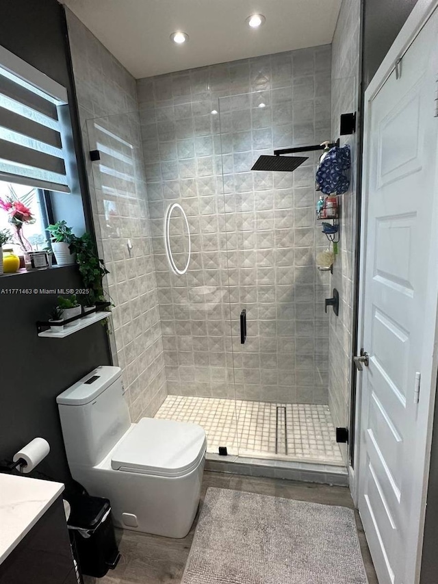 8868 NW 161st Ter, Miami Lakes, FL 33018 - full bath with vanity, a shower stall, recessed lighting, and wood finished floors