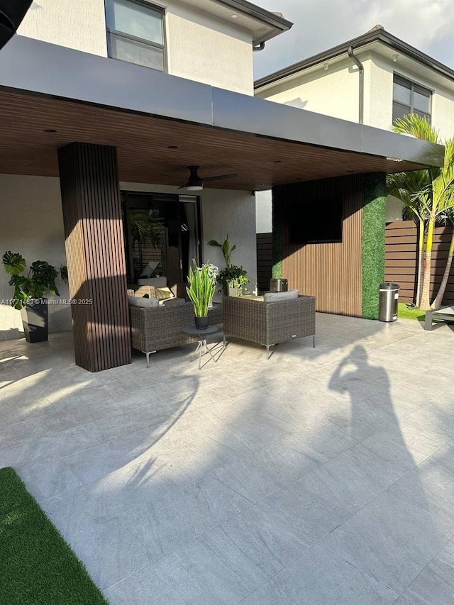 8868 NW 161st Ter, Miami Lakes, FL 33018 - view of patio featuring an outdoor hangout area and ceiling fan
