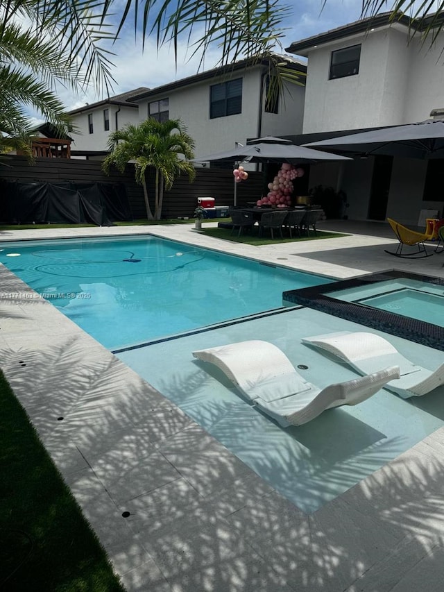 8868 NW 161st Ter, Miami Lakes, FL 33018 - view of pool with a patio area and a pool with connected hot tub