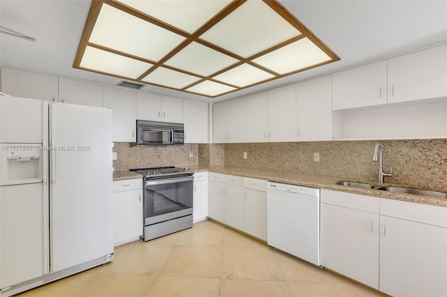 dining area featuring baseboards