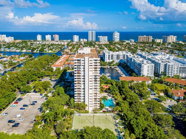 bird's eye view featuring a water view and a city view