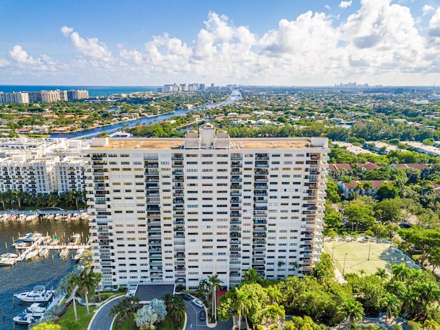 bird's eye view featuring a water view and a city view