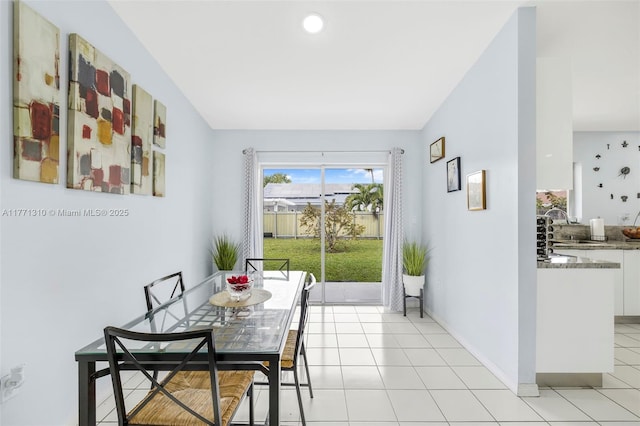 15317 SW 179th Ter, Miami, FL 33187 - dining space with baseboards and light tile patterned floors