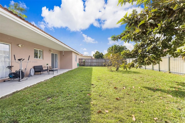 15317 SW 179th Ter, Miami, FL 33187 - view of yard featuring a patio and a fenced backyard
