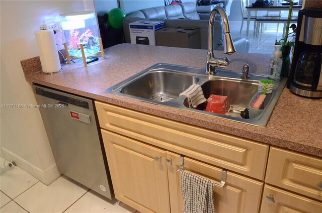 8883 Fontainebleau Blvd Unit 202, Miami, FL 33172 - kitchen featuring stainless steel dishwasher, a sink, and tile patterned flooring