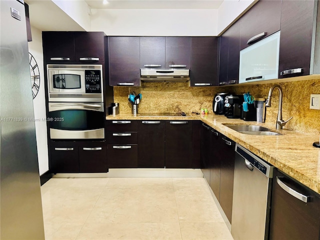 3600 Mystic Pointe Dr Unit 1210, Aventura, FL 33180 - kitchen featuring appliances with stainless steel finishes, extractor fan, and backsplash