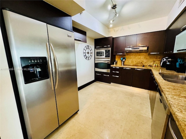 3600 Mystic Pointe Dr Unit 1210, Aventura, FL 33180 - kitchen featuring appliances with stainless steel finishes, ventilation hood, backsplash, a sink, and dark brown cabinets