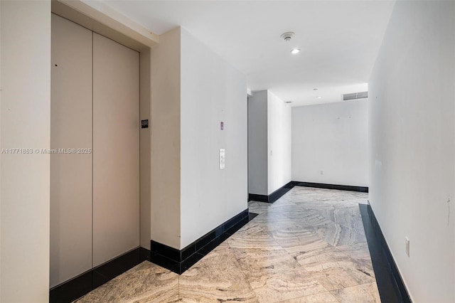 1100 Biscayne Blvd Unit 4901, Miami, FL 33132 - hall with elevator, marble finish floors, and recessed lighting