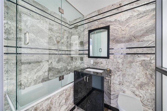 1100 Biscayne Blvd Unit 4901, Miami, FL 33132 - bathroom featuring shower / bath combination with glass door, vanity, and tile walls