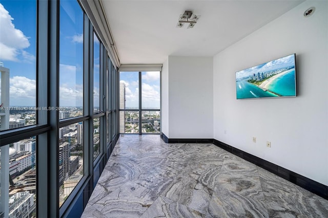 1100 Biscayne Blvd Unit 4901, Miami, FL 33132 - spare room featuring floor to ceiling windows and a city view