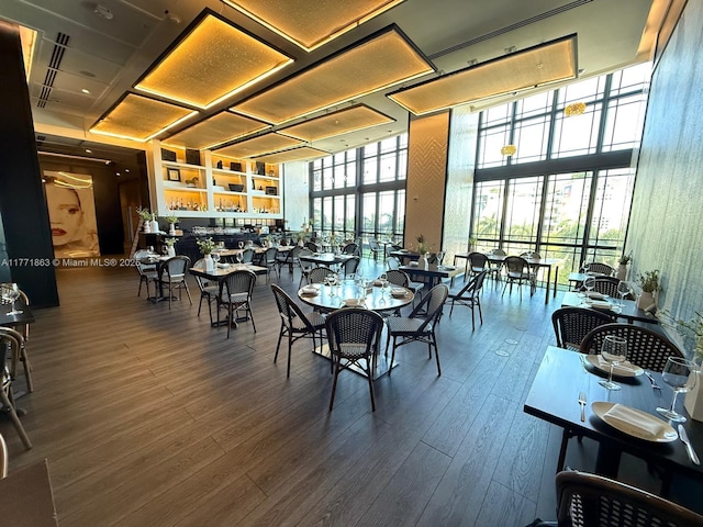 1100 Biscayne Blvd Unit 4901, Miami, FL 33132 - dining room featuring floor to ceiling windows and wood finished floors