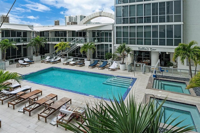 1100 Biscayne Blvd Unit 4901, Miami, FL 33132 - community pool featuring a hot tub and a patio area