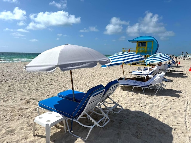 1100 Biscayne Blvd Unit 4901, Miami, FL 33132 - view of patio with view of water and beach and a grill