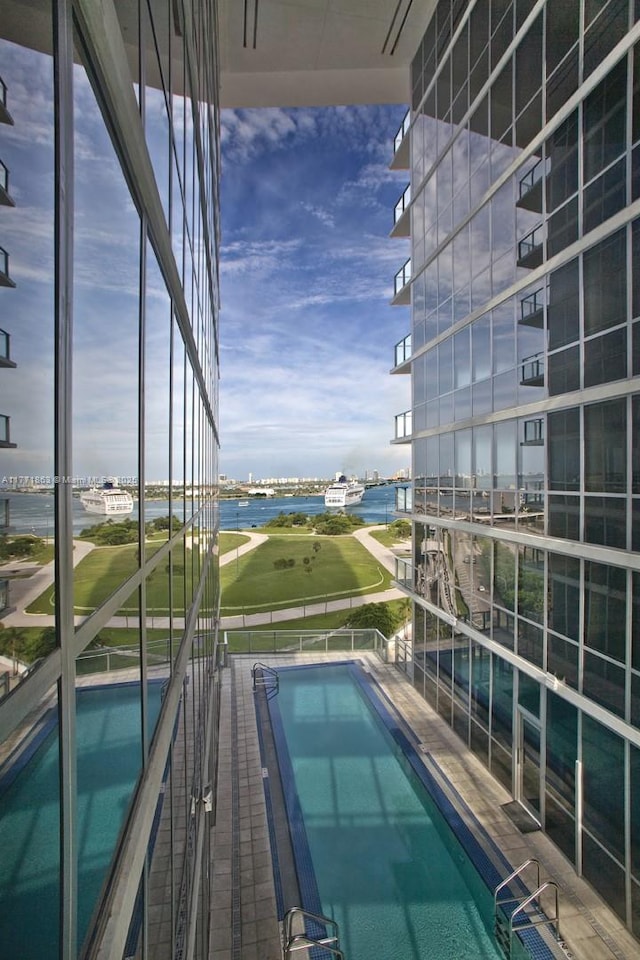 1100 Biscayne Blvd Unit 4901, Miami, FL 33132 - community pool with a water view and view of golf course