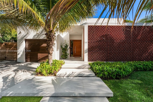 exterior space featuring stucco siding