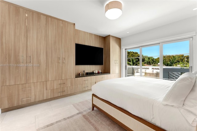 bedroom featuring light tile patterned floors