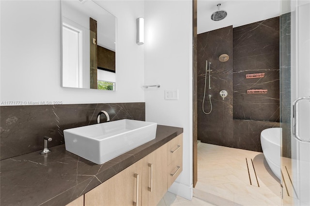 full bath with decorative backsplash, a walk in shower, and vanity