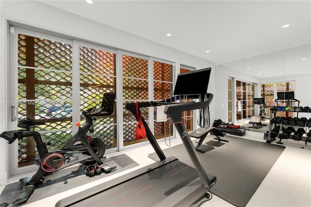 workout area with recessed lighting