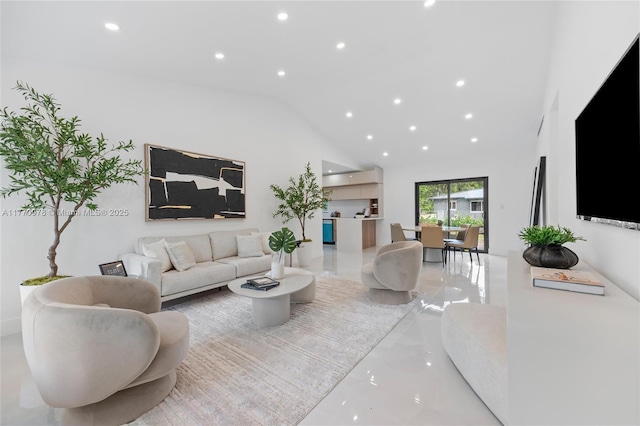 475 NW 87th St, El Portal, FL 33150 - living room with recessed lighting, lofted ceiling, and light marble finish floors