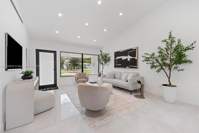 475 NW 87th St, El Portal, FL 33150 - living room featuring recessed lighting, high vaulted ceiling, and baseboards