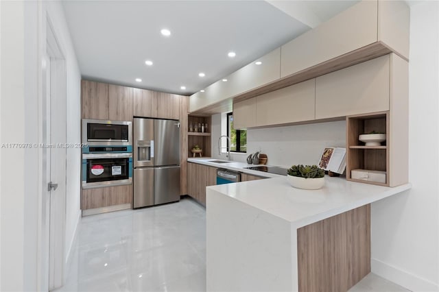 475 NW 87th St, El Portal, FL 33150 - kitchen with stainless steel appliances, modern cabinets, open shelves, light countertops, and recessed lighting