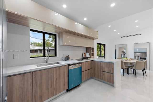 475 NW 87th St, El Portal, FL 33150 - kitchen with dishwasher, modern cabinets, a sink, a peninsula, and light countertops