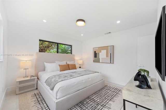 475 NW 87th St, El Portal, FL 33150 - bedroom featuring baseboards and recessed lighting