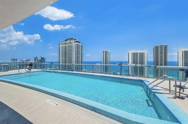2600 E Hallandale Beach Blvd Unit T1001, Hallandale Beach, FL 33009 - community pool featuring central AC and a view of city