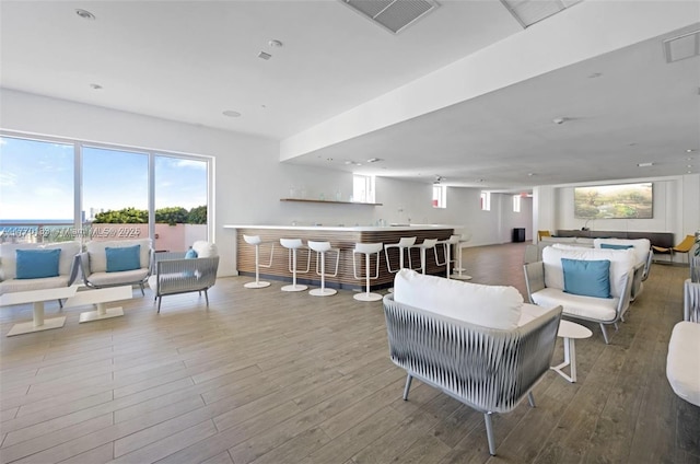 2600 E Hallandale Beach Blvd Unit T1001, Hallandale Beach, FL 33009 - living room featuring a community bar and wood finished floors