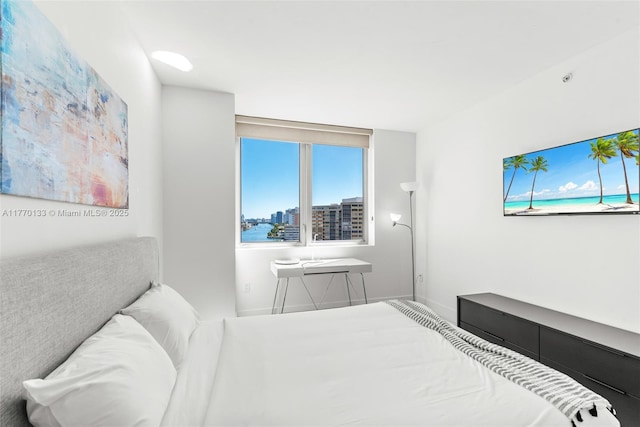 2600 E Hallandale Beach Blvd Unit T1001, Hallandale Beach, FL 33009 - bedroom featuring multiple windows and baseboards