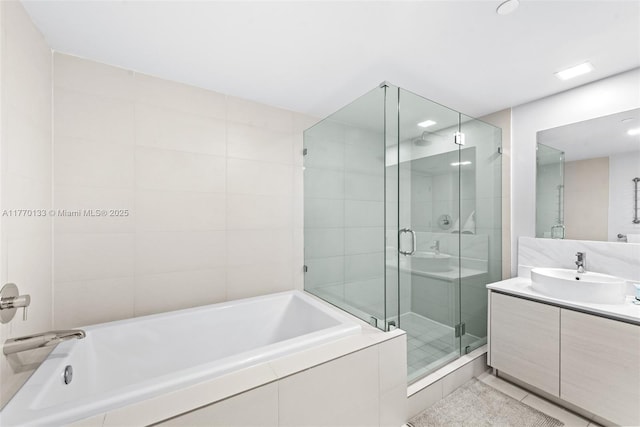 2600 E Hallandale Beach Blvd Unit T1001, Hallandale Beach, FL 33009 - full bathroom featuring vanity, a shower stall, a bath, tile patterned floors, and recessed lighting