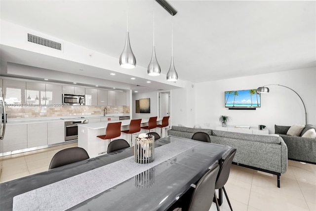 2600 E Hallandale Beach Blvd Unit T1001, Hallandale Beach, FL 33009 - dining area with light tile patterned flooring and recessed lighting