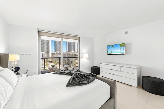 2600 E Hallandale Beach Blvd Unit T1001, Hallandale Beach, FL 33009 - bedroom featuring tile patterned flooring and a wall of windows