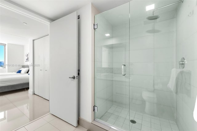2600 E Hallandale Beach Blvd Unit T1001, Hallandale Beach, FL 33009 - bathroom featuring ensuite bath, a stall shower, and tile patterned floors