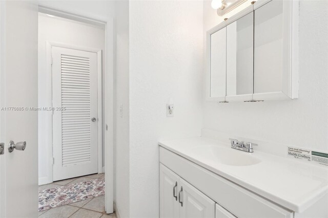 4499 NW 18th Ave, Oakland Park, FL 33309 - bathroom featuring vanity and tile patterned flooring