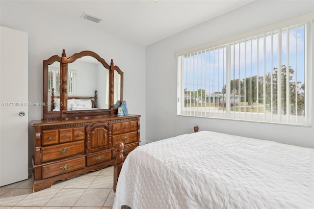 4499 NW 18th Ave, Oakland Park, FL 33309 - bedroom featuring multiple windows and light tile patterned floors