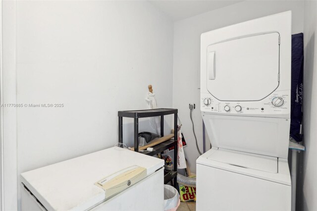 4499 NW 18th Ave, Oakland Park, FL 33309 - clothes washing area with stacked washing machine and dryer