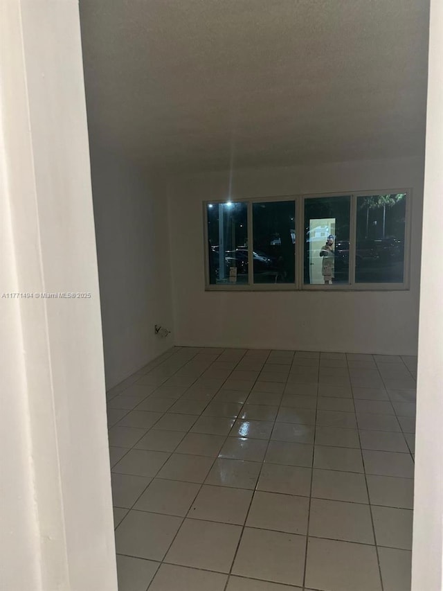 view of tiled spare room