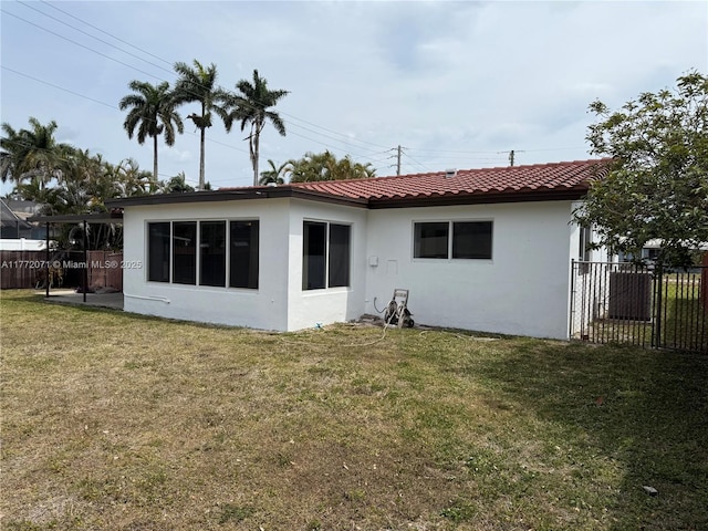 326 N 32nd Ave, Hollywood, FL 33021 - rear view of property with stucco siding and a tiled roof