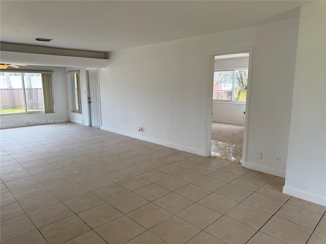 326 N 32nd Ave, Hollywood, FL 33021 - unfurnished room featuring light tile patterned flooring and baseboards