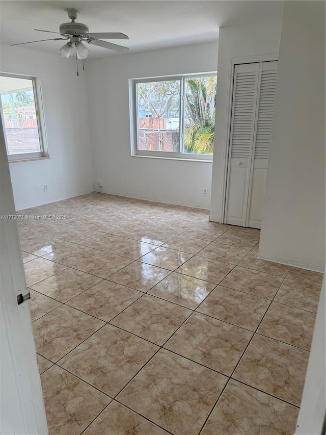 326 N 32nd Ave, Hollywood, FL 33021 - empty room featuring light tile patterned floors and a ceiling fan