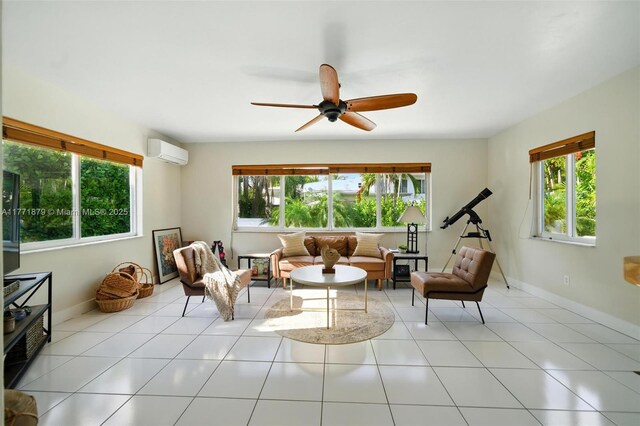 1259 NE 98th St, Miami Shores, FL 33138 - tiled living area featuring a wall mounted AC, plenty of natural light, baseboards, and ceiling fan