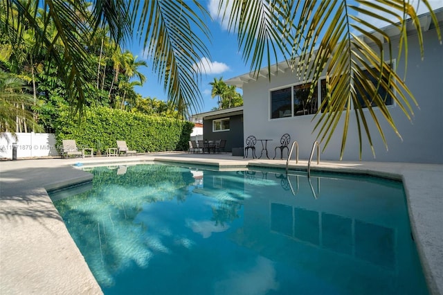 1259 NE 98th St, Miami Shores, FL 33138 - view of pool with a patio, a fenced in pool, and fence
