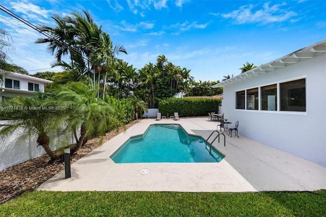 1259 NE 98th St, Miami Shores, FL 33138 - view of pool with a patio, a fenced in pool, and fence