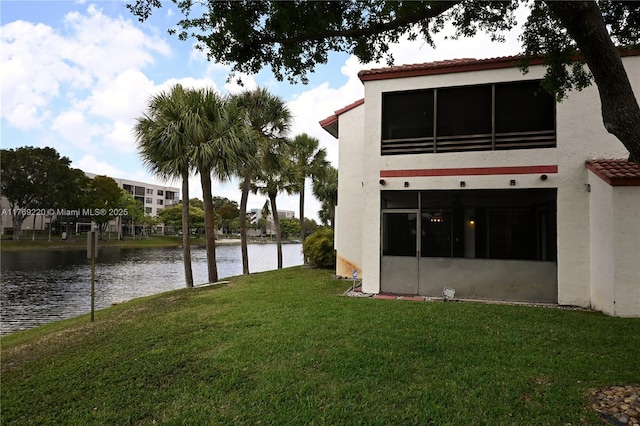 1170 N Hiatus Rd Unit 1170, Pembroke Pines, FL 33026 - view of green lawn with a water view