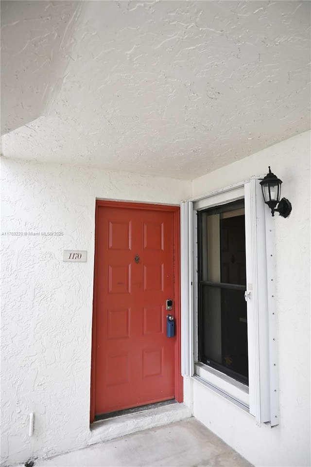1170 N Hiatus Rd Unit 1170, Pembroke Pines, FL 33026 - property entrance with stucco siding