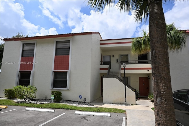 1170 N Hiatus Rd Unit 1170, Pembroke Pines, FL 33026 - view of property with uncovered parking